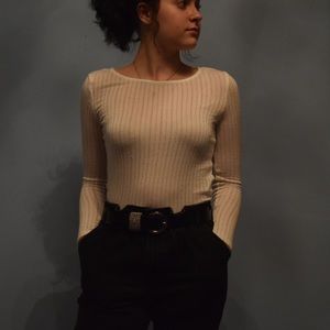 Cute see through long sleeve with strappy back.